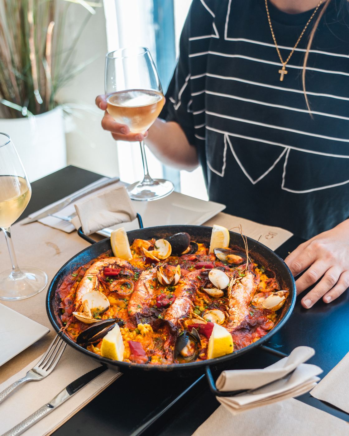 Calypso's homemade seafood paella served on the terrace